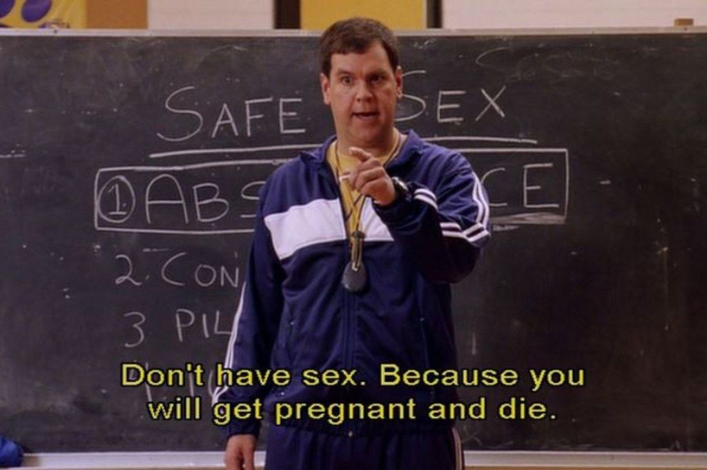 Screencap from the movie Mean Girls, of the character Coach Carr, pointing to his students and saying "Don't have sex. Because you will get pregnant and die."