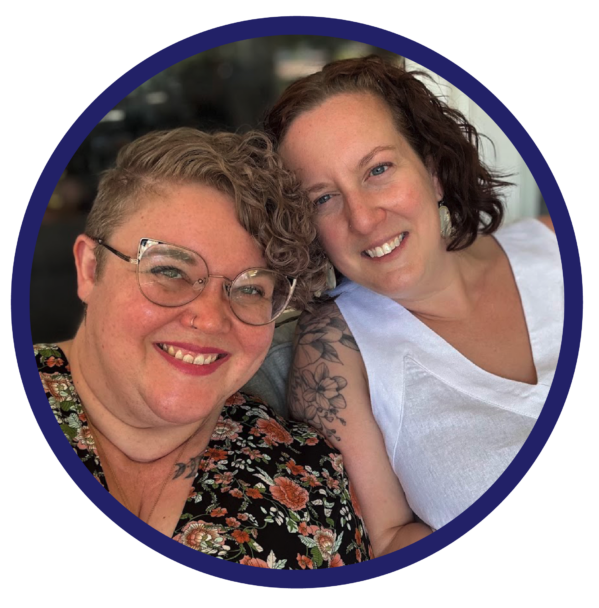 Two women leaning in closely for a selfie.